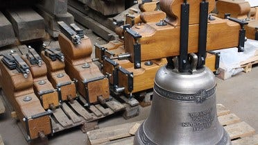 Bronze bell complete with wooden yoke